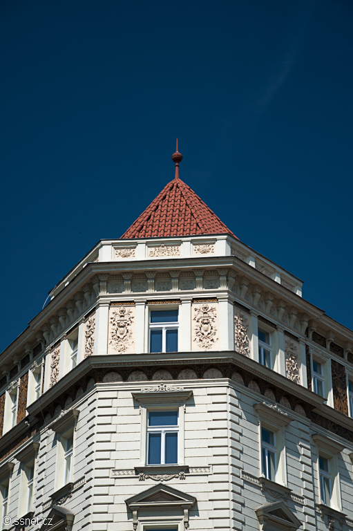 The facade of historic houses in Prague